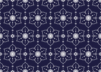 Seamless white floral blooming on dark blue background, ethnic fabric pattern, Portuguese style, design for cloth, carpet, batik, wallpaper, wrapping etc.