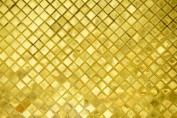 Gold Textured Background with Diamond Pattern and Reflective Shine