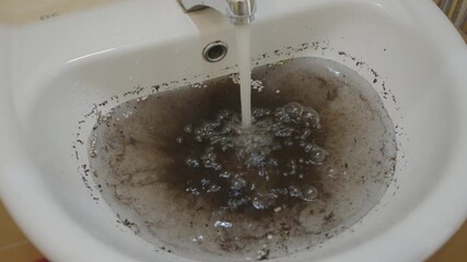 There is a serious issue of dirty water overflowing in the sink that needs immediate attention