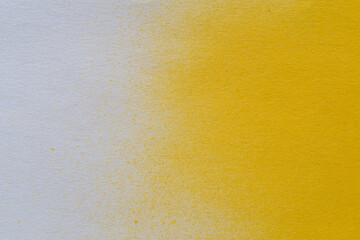 黄色のスプレー塗料で描いた背景