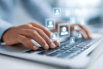 Engaging in Online Communication Through a Laptop With Virtual User Icons Displayed Above the Keyboard