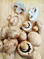 Fresh Whole and Sliced Cremini Mushrooms