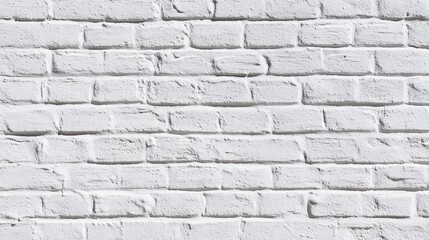 Fototapeta premium A white-painted brick wall with a traditional staggered pattern, slightly weathered texture, minor cracks,