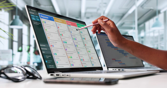 Busy Businesswoman Organizing Content Calendar On Laptop Screen