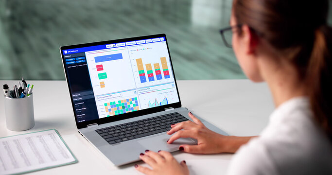 Marketing Manager Using Laptop