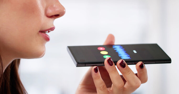 Woman Uses Voice-controlled Assistant On Smartphone