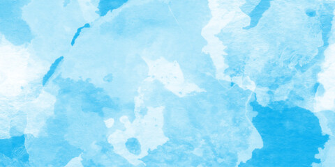 This image gives the impression of soft clouds in a sky blue watercolor image, Soft pastels mixed blue and white colors, soft paper textured canvas element for text design.