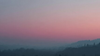 Misty sunrise over hills