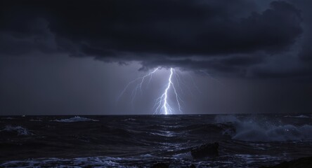 Sea storm with lightning during dark night