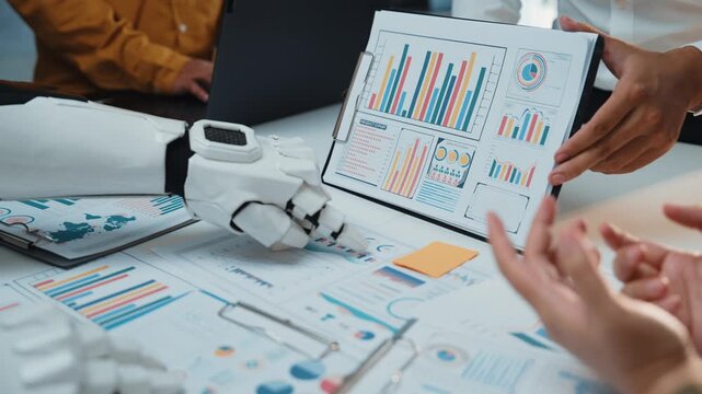 A collaborative meeting where AI-driven assistance enhances business research and marketing analytics, showcasing the power of artificial intelligence in modern offices. Noogenesis AI