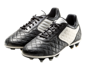 Classic black and white soccer cleats with quilted detail isolated on white background, PNG