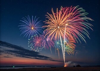 Spectacular fireworks light up the twilight sky with a vibrant and colorful display, celebrating a festive occasion over the horizon at dusk.