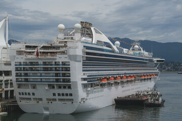 Modern Princess cruiseship cruise ship liner Grand in Vancouver, Canada port on blue sky sunny cloudy day before Alaska cruise British Columbia