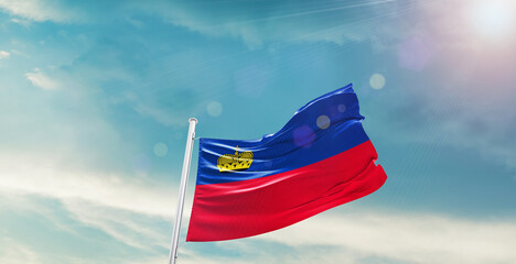 Liechtenstein national flag waving with beautiful sky.