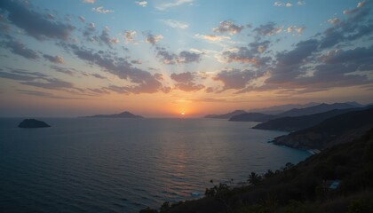 An orange and blue sunset over the ocean provides a vivid reflection across the water's surface