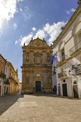 The facade of an old church in the medieval quarter of Galatone, an old town in Puglia, Italy.