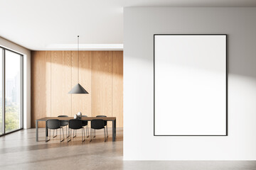Empty poster mockup on white wall in modern dining room interior with wooden panels, concrete floor and clean minimalist design concept template layout. 3D Rendering