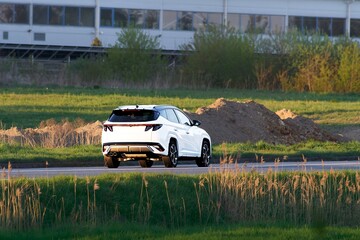 Electric vehicle displays modern design on highway