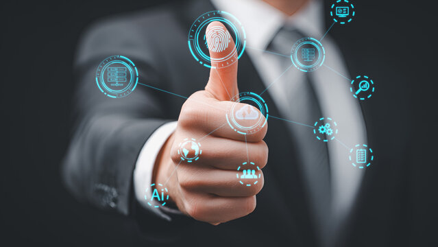 Businessman uses fingerprint scan with digital interface technology icons.