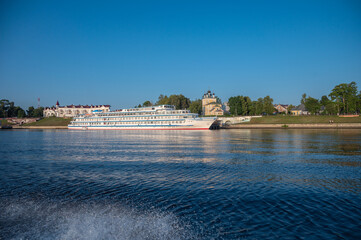 Cityscape with cruise ship at the pier and buildings Kremlin in the ancient Russian city of Uglich.