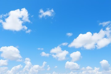 Naklejka premium White clouds floating on vivid blue sky background on sunny day
