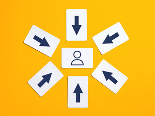 Arrows pointing to person icon on colorful background