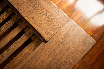 close up of a wooden bed.