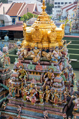 Fototapeta premium Hindy mythology deities on the roof of Sri Veeramakaliamman Temple in the Little India area, Singapore