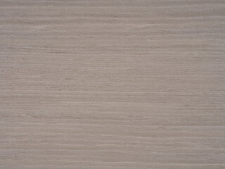 Gentle gradients of gray and muted earth tones cascade across the sturdy ash wood veneer, offering a canvas of understated elegance