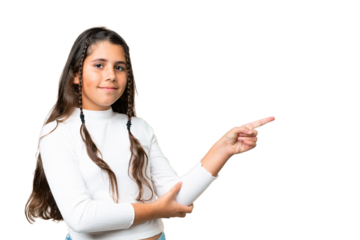 Young girl over isolated chroma key background pointing finger to the side