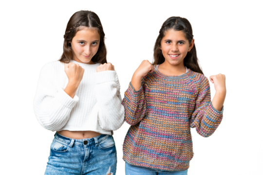 Friends girls over isolated chroma key background celebrating a victory in winner position - Powered by Adobe