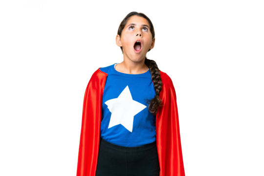 Super Hero girl over isolated chroma key background looking up and with surprised expression