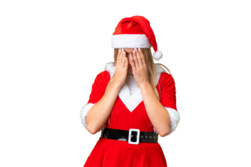 Young blonde woman with christmas hat over isolated chroma key background with tired and sick expression