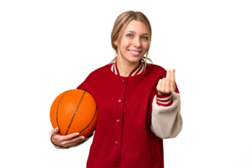 Young hispanic woman playing basketball over isolated white background making money gesture