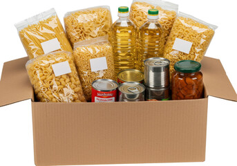 A cardboard box filled with various pasta, oils, and canned goods, ready for distribution