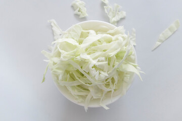 Thinly sliced raw cabbage ready to cook