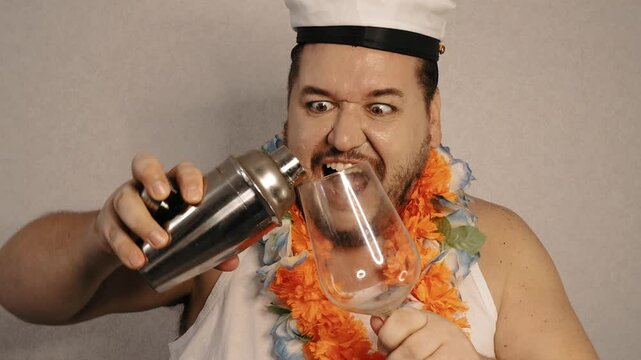 A drunk man dances and enjoys life.