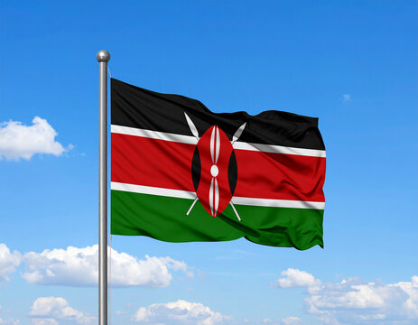 Kenya flag waving in the wind against a blue sky