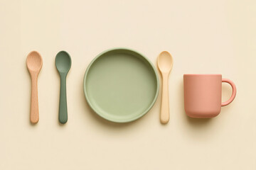 Minimalist flat lay feeding set displays calm and gentle colors