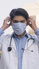 Vertical Photo of Indian Doctor Wearing Mask