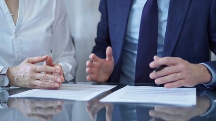 Business people and lawyers a contract papers before signing the agreement. Teamwork concept