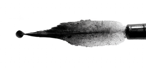 A fountain pen nib with black ink isolated on transparent background