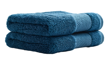 Soft Indigo Comfort: Two luxuriously soft, folded indigo-colored towels stacked neatly, promising ultimate comfort and spa-like relaxation, a minimalist aesthetic focus on texture and tranquility.