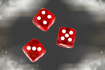A random arrangement of dice and a puzzle cup, captured after the dice have been cast.