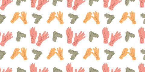 Warm fall apparel seamless pattern with gloves in flat style. Autumn vector illustration for creative design needs