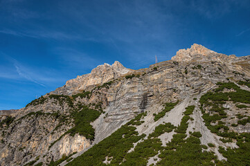 autumnal mountain landscape inside the Stelvio National Park along the Lombard side, Sondrio, Italy
