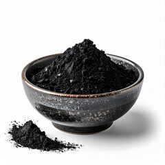 A dark, textured bowl filled with black powder used in various culinary applications, showcasing rich colors and dynamic textures.