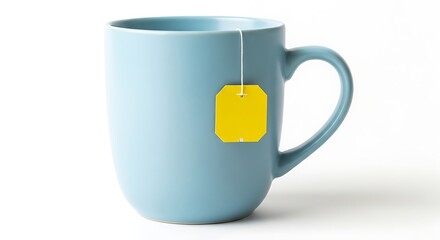 Light blue mug with tea bag on white background