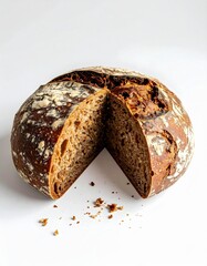 Artisan bread loaf cut in half, showcasing its crusty exterior and soft interior. Perfect for culinary displays and food photography.