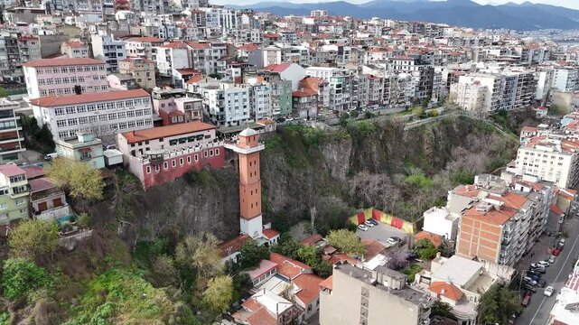 Aerial 4k view of the historical elevator, the symbol of Izmir city, on a sunny day